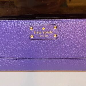 kate spade purple pebbled leather wallet with gold logo plate